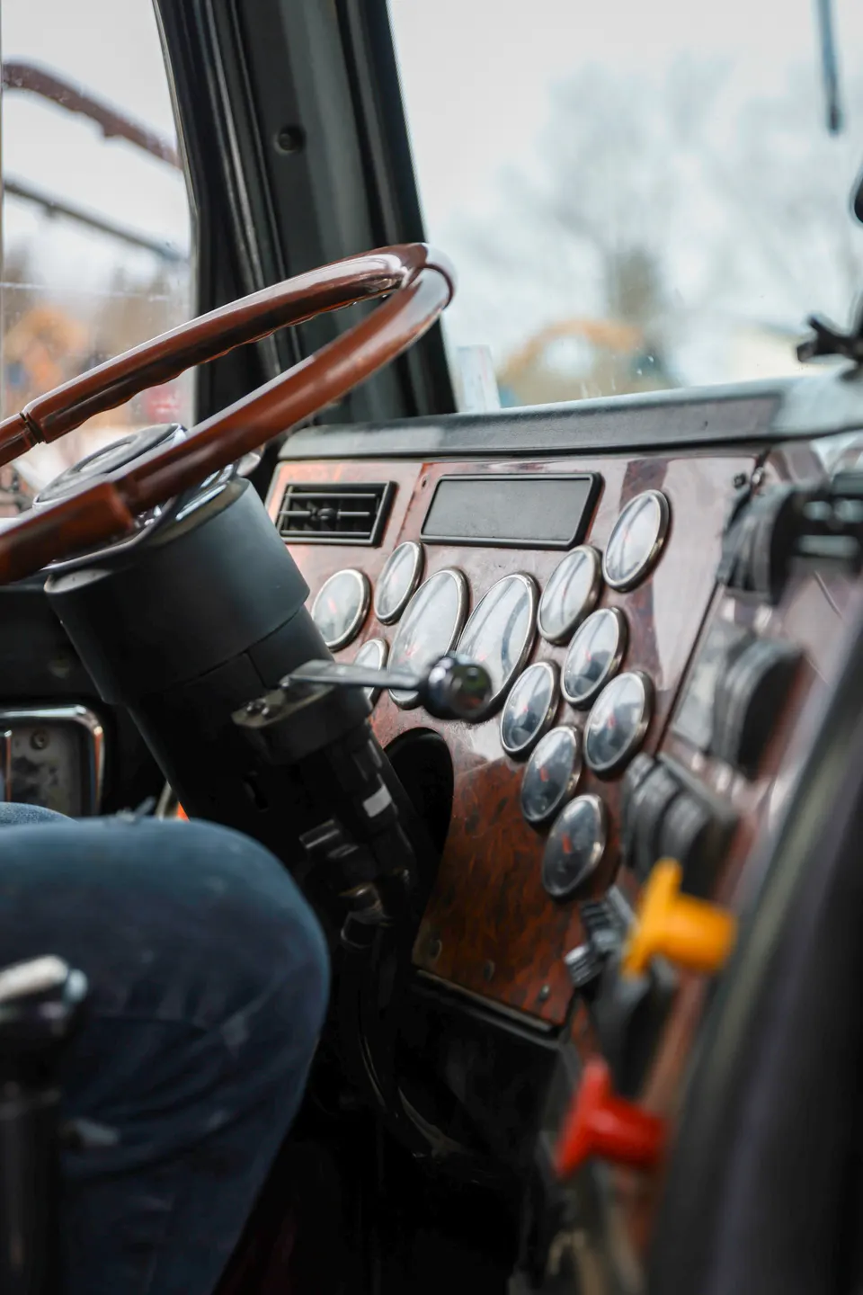Dashboard and steering wheel of a job site truck.